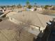 View of home featuring light tan stucco and desert landscaping at 3714 Mount Charleston Dr, Pahrump, NV 89048