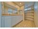 Bright bathroom features double sinks with plenty of storage and shelving at 3714 Mount Charleston Dr, Pahrump, NV 89048