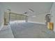 Open two-car garage with ample space, and water heater at 3714 Mount Charleston Dr, Pahrump, NV 89048