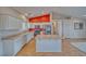 Well-lit kitchen featuring stainless steel appliances, a center island, and plenty of cabinet space at 3714 Mount Charleston Dr, Pahrump, NV 89048