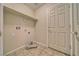 Laundry room with shelving and tile flooring at 3714 Mount Charleston Dr, Pahrump, NV 89048