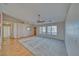 Living room features natural light, a ceiling fan, and views of the outdoors at 3714 Mount Charleston Dr, Pahrump, NV 89048