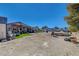 Expansive backyard featuring a pergola, shed, green grass and potential for customization at 4424 Shady Hollow Ave, North Las Vegas, NV 89031