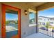 Balcony with orange door and view of neighboring homes at 4495 Violet Flowers St # 2046, North Las Vegas, NV 89031