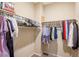 Spacious walk-in closet with ample hanging space and shelving at 4495 Violet Flowers St # 2046, North Las Vegas, NV 89031