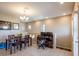 Dining area with table and chairs, adjacent to a home office at 4495 Violet Flowers St # 2046, North Las Vegas, NV 89031