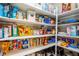 Well-stocked pantry with ample shelving for food storage at 4495 Violet Flowers St # 2046, North Las Vegas, NV 89031