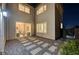 Cozy backyard with modern landscaping featuring stone pavers and view of dining area at 4499 Amazing View St, Las Vegas, NV 89129