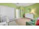 Cozy green Bedroom with white furniture at 4499 Amazing View St, Las Vegas, NV 89129