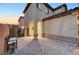 A brick entryway with a bench and a glimpse of the front door at 4499 Amazing View St, Las Vegas, NV 89129