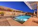 Backyard pool featuring a waterfall, in-pool seating, and a luxurious spa at 4499 Amazing View St, Las Vegas, NV 89129