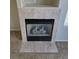 Gas fireplace with tile surround at 5018 Rio Linda Cir, North Las Vegas, NV 89031