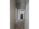 Hallway with tile flooring and access to bedrooms at 5018 Rio Linda Cir, North Las Vegas, NV 89031