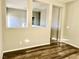 Loft area with wood-look floors and open railing at 5249 Fiery Sky Ridge St, Las Vegas, NV 89148