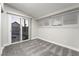 Bedroom with gray carpet and sliding glass doors leading to the pool at 5509 Evergreen Ave, Las Vegas, NV 89107