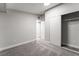 Bedroom with gray carpet and large closet at 5509 Evergreen Ave, Las Vegas, NV 89107