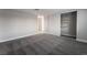 Bright bedroom with gray carpet and built-in shelving at 5509 Evergreen Ave, Las Vegas, NV 89107