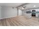 Light and bright dining area adjacent to the kitchen with wood-look flooring at 5509 Evergreen Ave, Las Vegas, NV 89107