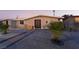 Single story home with updated landscaping and walkway at 5509 Evergreen Ave, Las Vegas, NV 89107