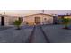 Updated single story home with new landscaping and walkway at 5509 Evergreen Ave, Las Vegas, NV 89107