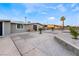 Single story home features a large, updated front yard at 5509 Evergreen Ave, Las Vegas, NV 89107