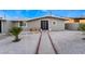 Remodeled single story home with new landscaping and walkway at 5509 Evergreen Ave, Las Vegas, NV 89107