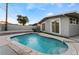 Clean lines and refreshing blue water in this kidney-shaped pool at 5509 Evergreen Ave, Las Vegas, NV 89107