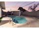 Inviting kidney-shaped pool with a pergola in the background at 5509 Evergreen Ave, Las Vegas, NV 89107