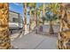 Charming backyard featuring an RV, palm trees, and a basketball hoop, creating a private oasis at 6005 Blowing Bellows St, Las Vegas, NV 89130