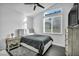 Serene bedroom featuring a modern design, plush bedding, and ample natural light at 6005 Blowing Bellows St, Las Vegas, NV 89130