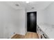 Practical laundry room featuring storage cabinets and a large sink at 6027 Stone Hollow Ave, Las Vegas, NV 89156