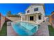 Backyard featuring a refreshing pool, perfect for relaxing and entertaining guests at 6027 Stone Hollow Ave, Las Vegas, NV 89156