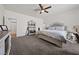 Large bedroom with king-size bed and ample floor space at 6101 Cavalry Trl, Pahrump, NV 89060