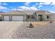 Modern single-story house with two car garage at 6101 Cavalry Trl, Pahrump, NV 89060