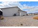 Side view of house showcasing a clean exterior and landscaping at 6101 Cavalry Trl, Pahrump, NV 89060