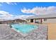 Spacious rectangular pool with gray stone decking at 6101 Cavalry Trl, Pahrump, NV 89060