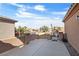 Single-story home showcasing a gated front entrance and desert landscaping at 6151 Moonlight Sonata Ave, Las Vegas, NV 89122