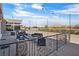 Patio seating area with mountain views and decorative string lights at 6151 Moonlight Sonata Ave, Las Vegas, NV 89122