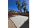 Large backyard with concrete patio and gravel landscaping at 6460 Raven Hall St, North Las Vegas, NV 89084