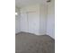 Spacious bedroom closet with double doors at 6460 Raven Hall St, North Las Vegas, NV 89084