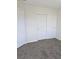 Spacious bedroom closet with double doors at 6460 Raven Hall St, North Las Vegas, NV 89084