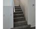 Carpeted staircase leading to the upper level of the home at 6460 Raven Hall St, North Las Vegas, NV 89084