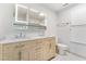 Updated double vanity in a well-lit bathroom at 659 D Ave, Boulder City, NV 89005