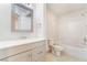 Clean, well-lit bathroom featuring a shower and vanity at 659 D Ave, Boulder City, NV 89005