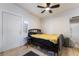 Bedroom featuring wood-look floors and a black ceiling fan at 659 D Ave, Boulder City, NV 89005