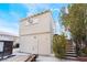 View of house exterior with stairs and second story access at 659 D Ave, Boulder City, NV 89005