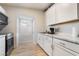 Kitchen featuring white cabinets and stainless steel appliances at 659 D Ave, Boulder City, NV 89005