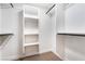 Walk-in closet with custom shelving for optimal organization at 659 D Ave, Boulder City, NV 89005