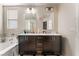 Double vanity bathroom with a soaking tub at 6713 Chambers Lake Ct, North Las Vegas, NV 89084