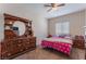 Bedroom with a queen bed, dresser and window at 6713 Chambers Lake Ct, North Las Vegas, NV 89084